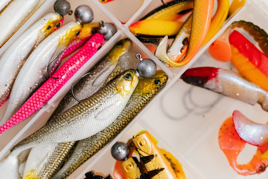 Close-up of colorful fishing lures in a tackle box, perfect for angling enthusiasts.